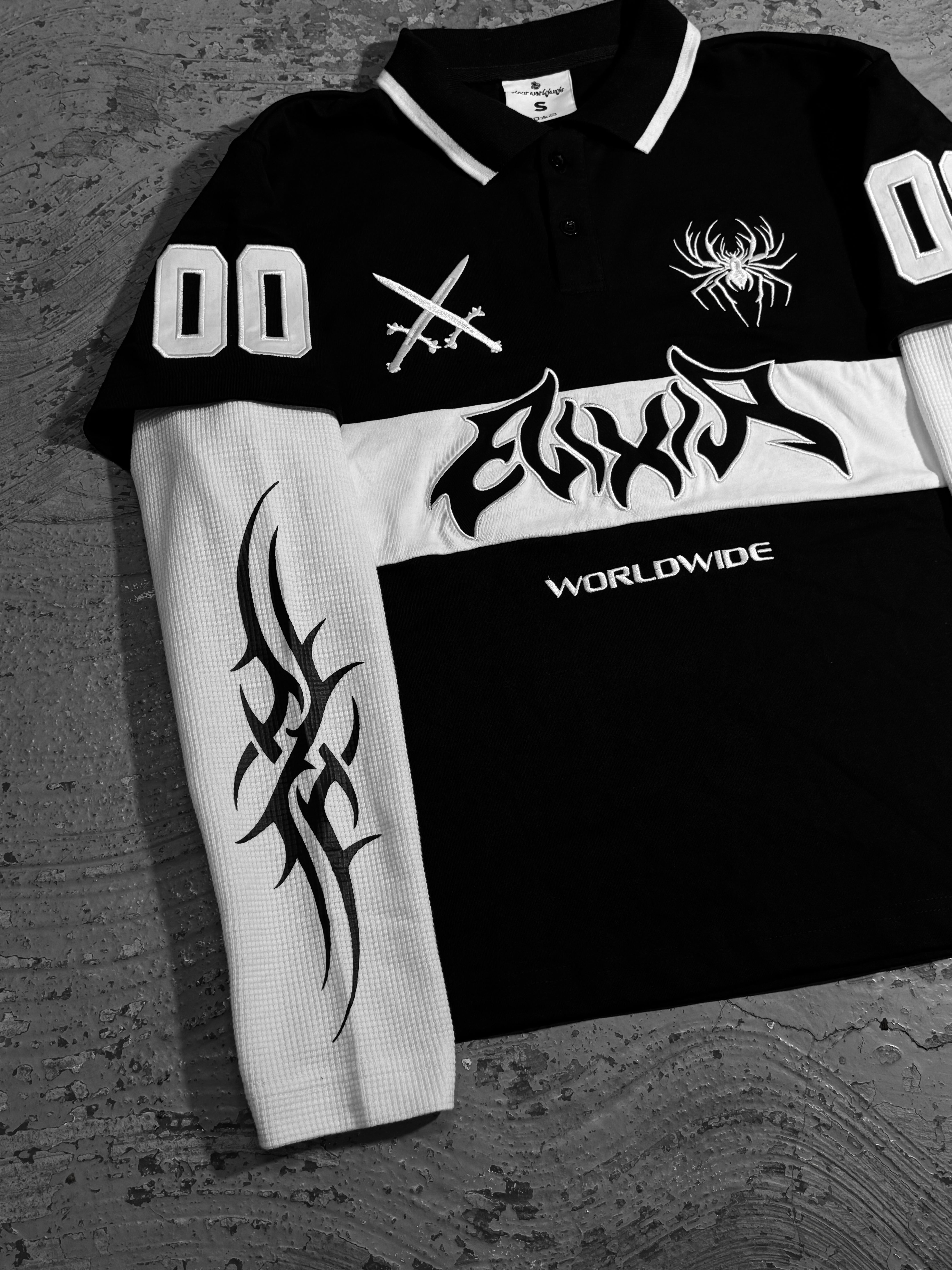 Elixir 00 Black Tribal Polo