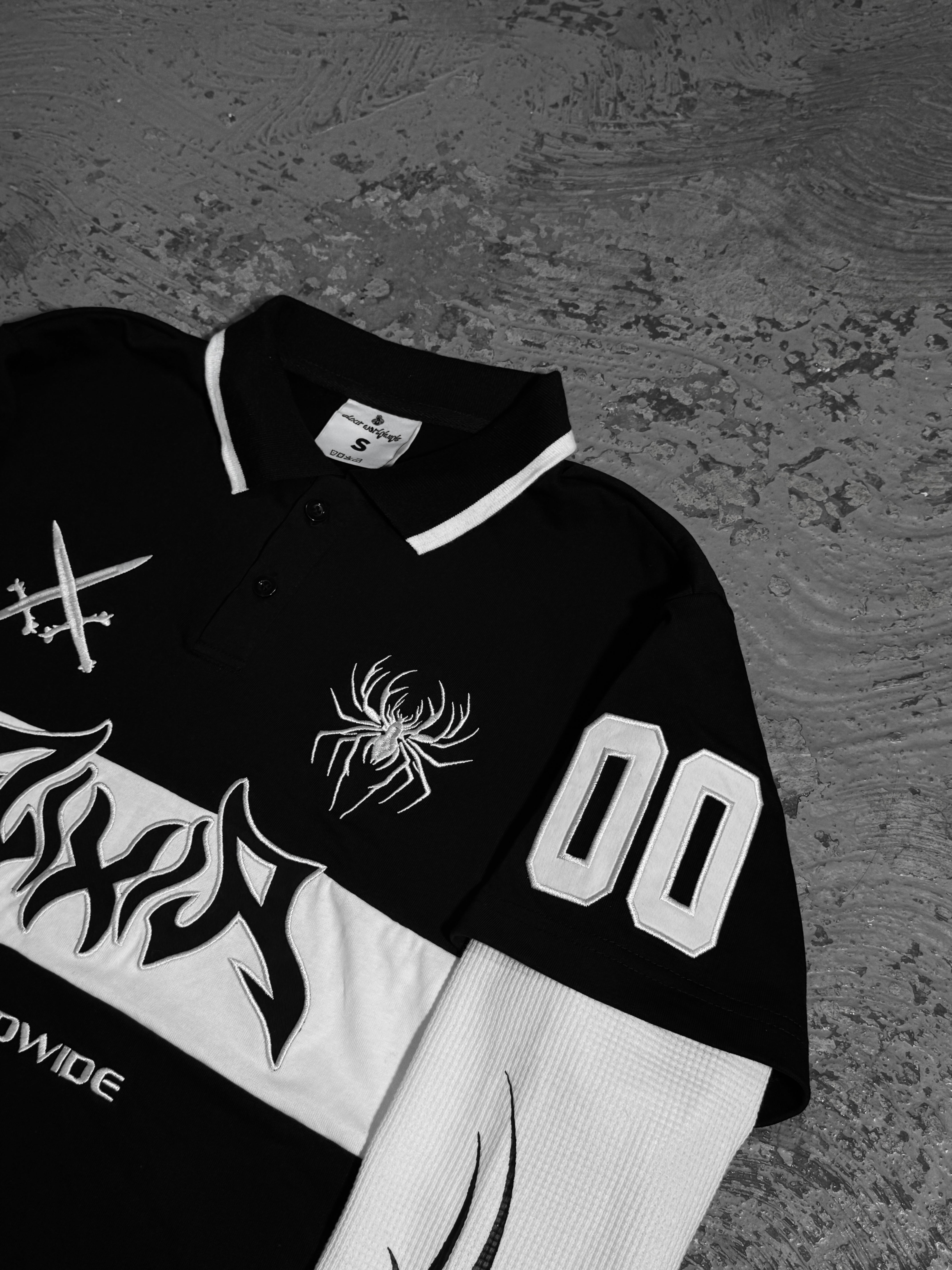Elixir 00 Black Tribal Polo